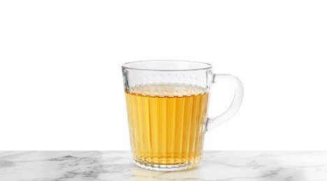 Refreshing green tea in cup on marble table against white background