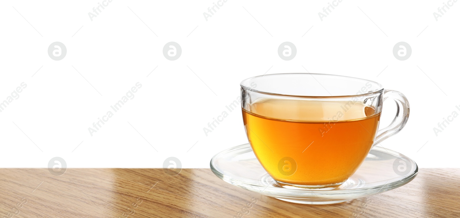 Photo of Refreshing green tea in cup on wooden table against white background. Space for text