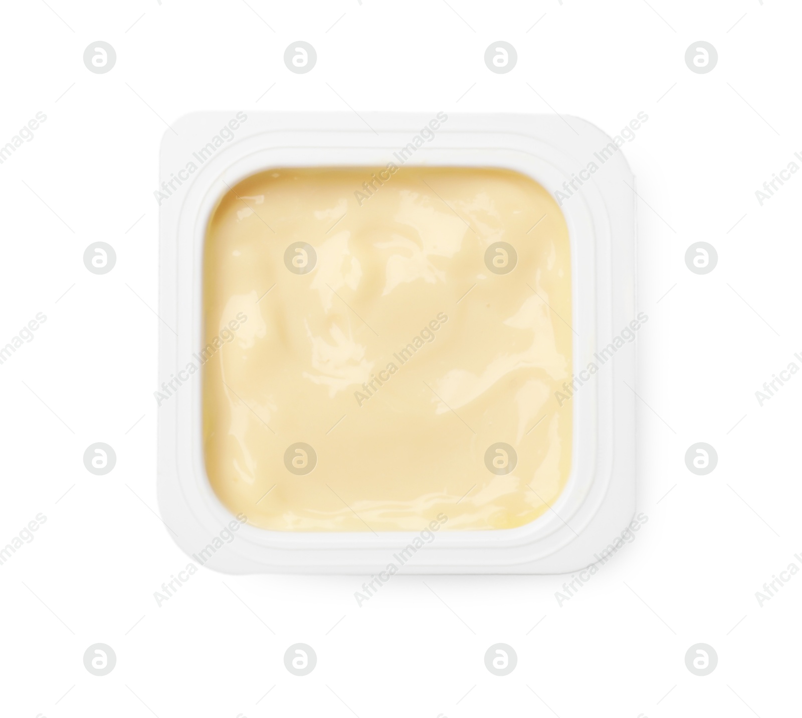 Photo of Delicious yogurt in plastic cup isolated on white, top view