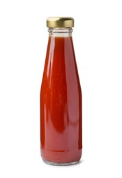 Photo of Delicious sauce in glass bottle isolated on white