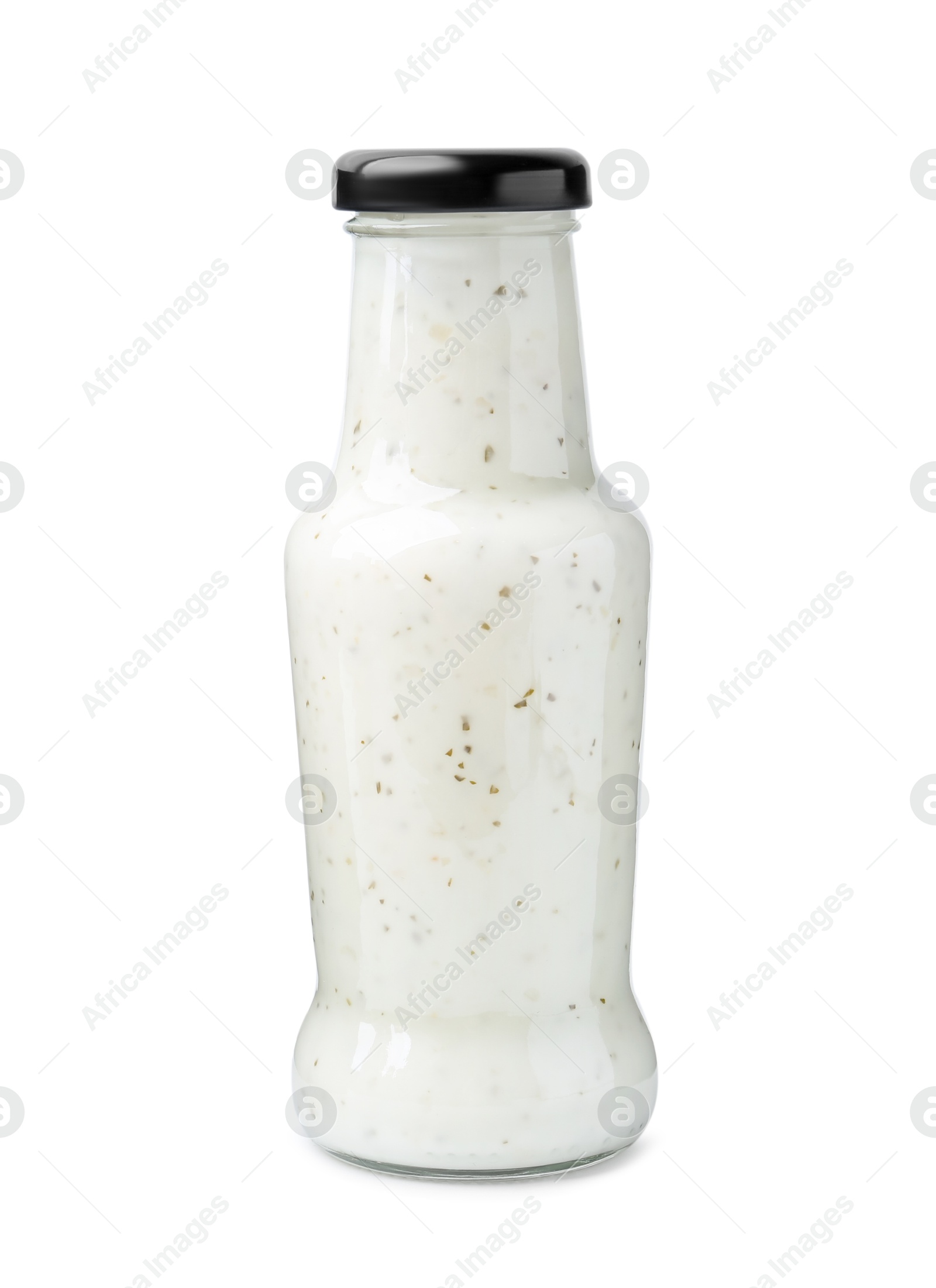 Photo of Delicious sauce in glass bottle isolated on white