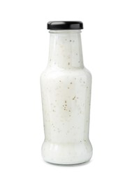 Photo of Delicious sauce in glass bottle isolated on white