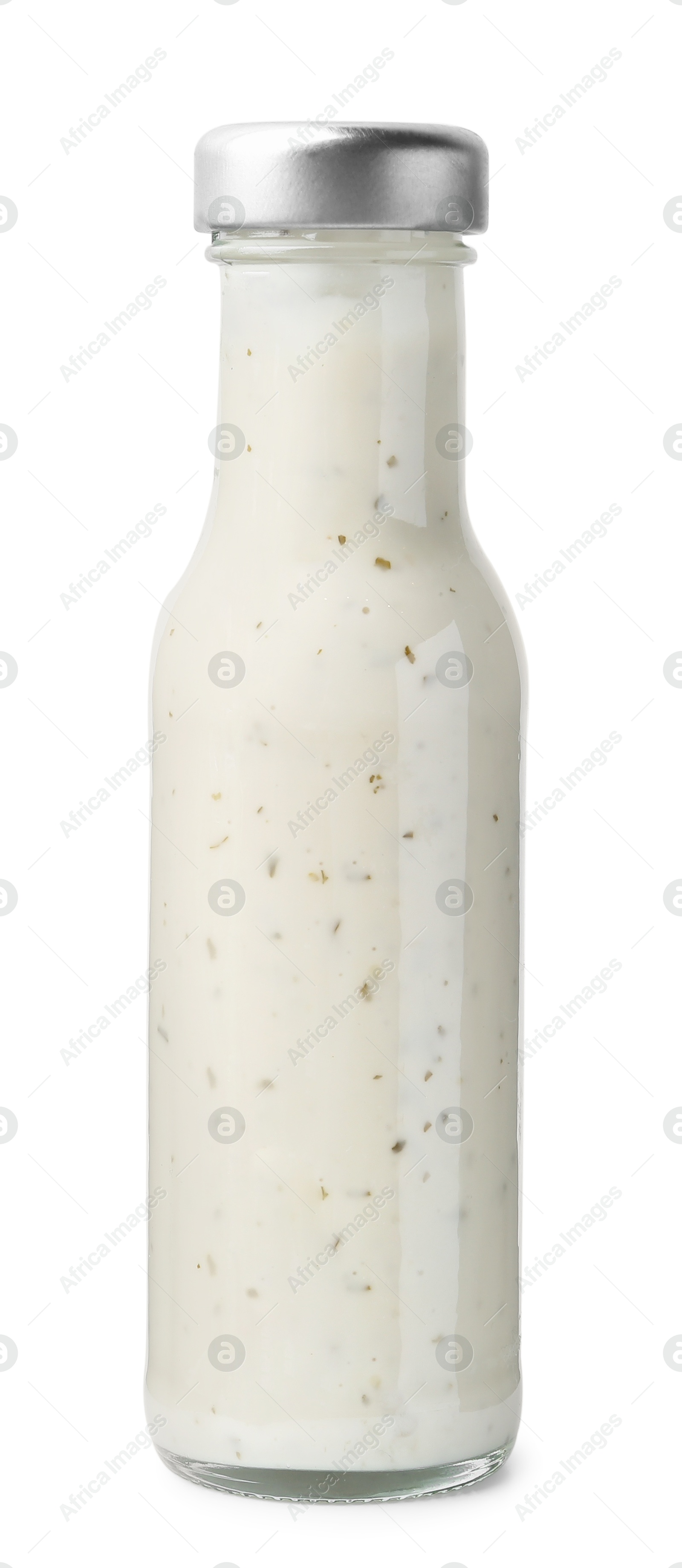 Photo of Delicious sauce in glass bottle isolated on white