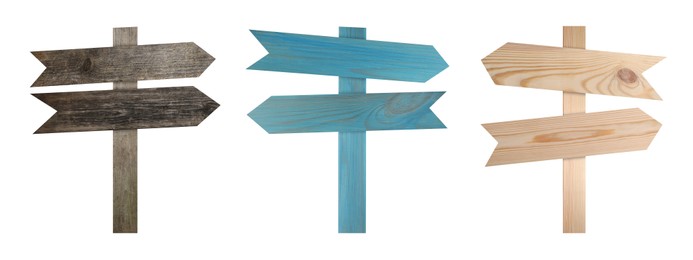 Image of Wooden signposts with arrow-shaped pointers isolated on white