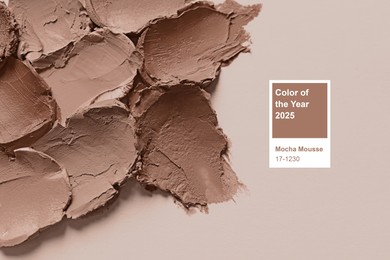 Image of Lipstick samples in mocha mousse shades on beige background, top view. Trendy color of 2025 year