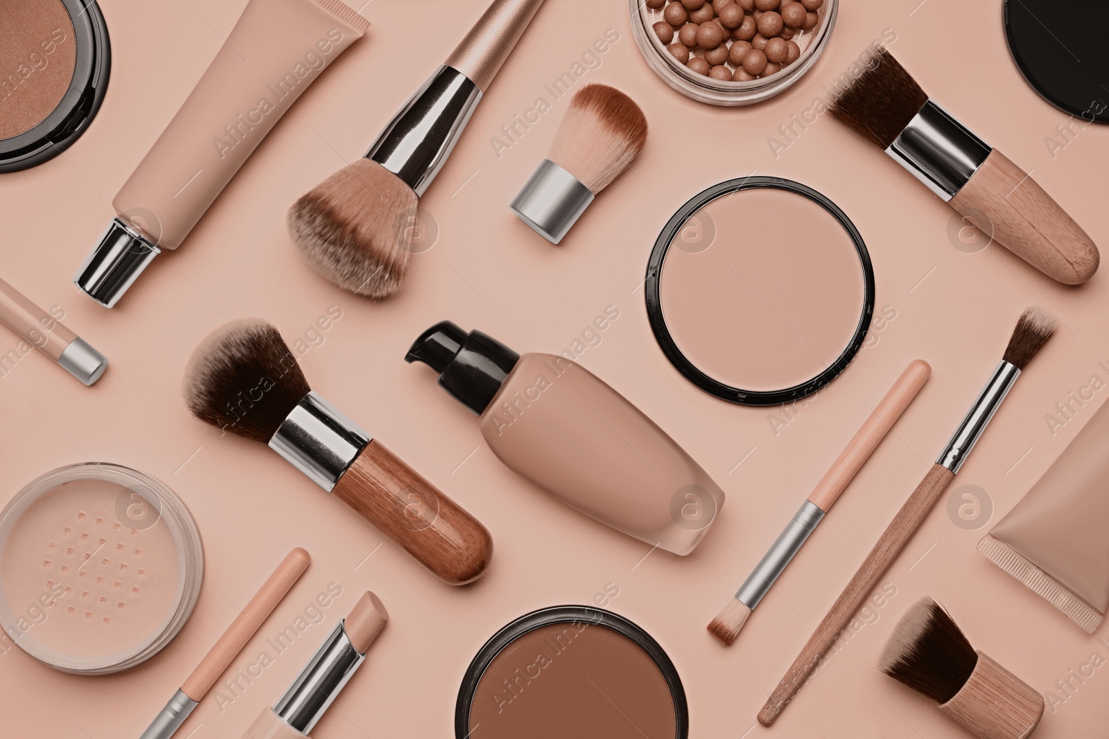 Image of Makeup products on beige background, flat lay. Mocha mousse - trendy color of 2025 year