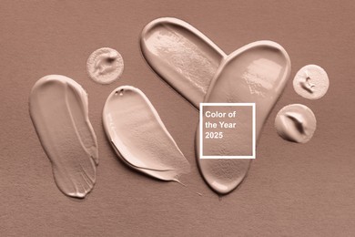 Image of Mocha mousse - trendy color of 2025 year. Samples of liquid foundations on brown shade background, top view