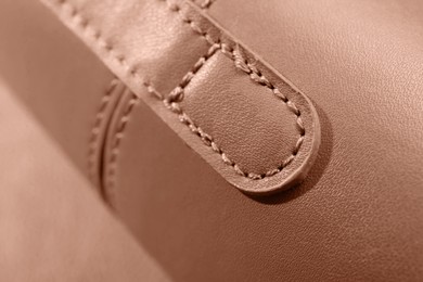 Image of Leather bag in mocha mousse shade, closeup. Trendy color of 2025 year