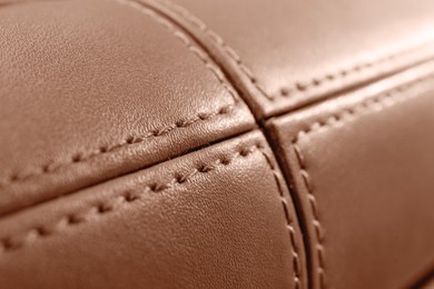 Image of Leather bag in mocha mousse shade, closeup. Trendy color of 2025 year