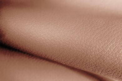 Image of Leather in mocha mousse shade, closeup. Trendy color of 2025 year