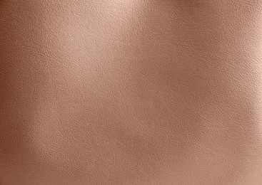 Image of Leather in mocha mousse shade, closeup. Trendy color of 2025 year