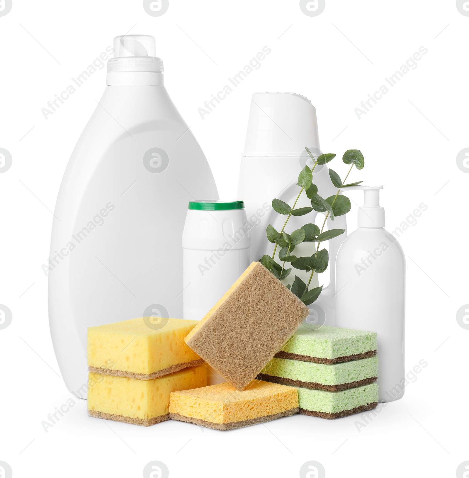 Photo of Eco-friendly cleaning products, sponges and eucalyptus branches isolated on white