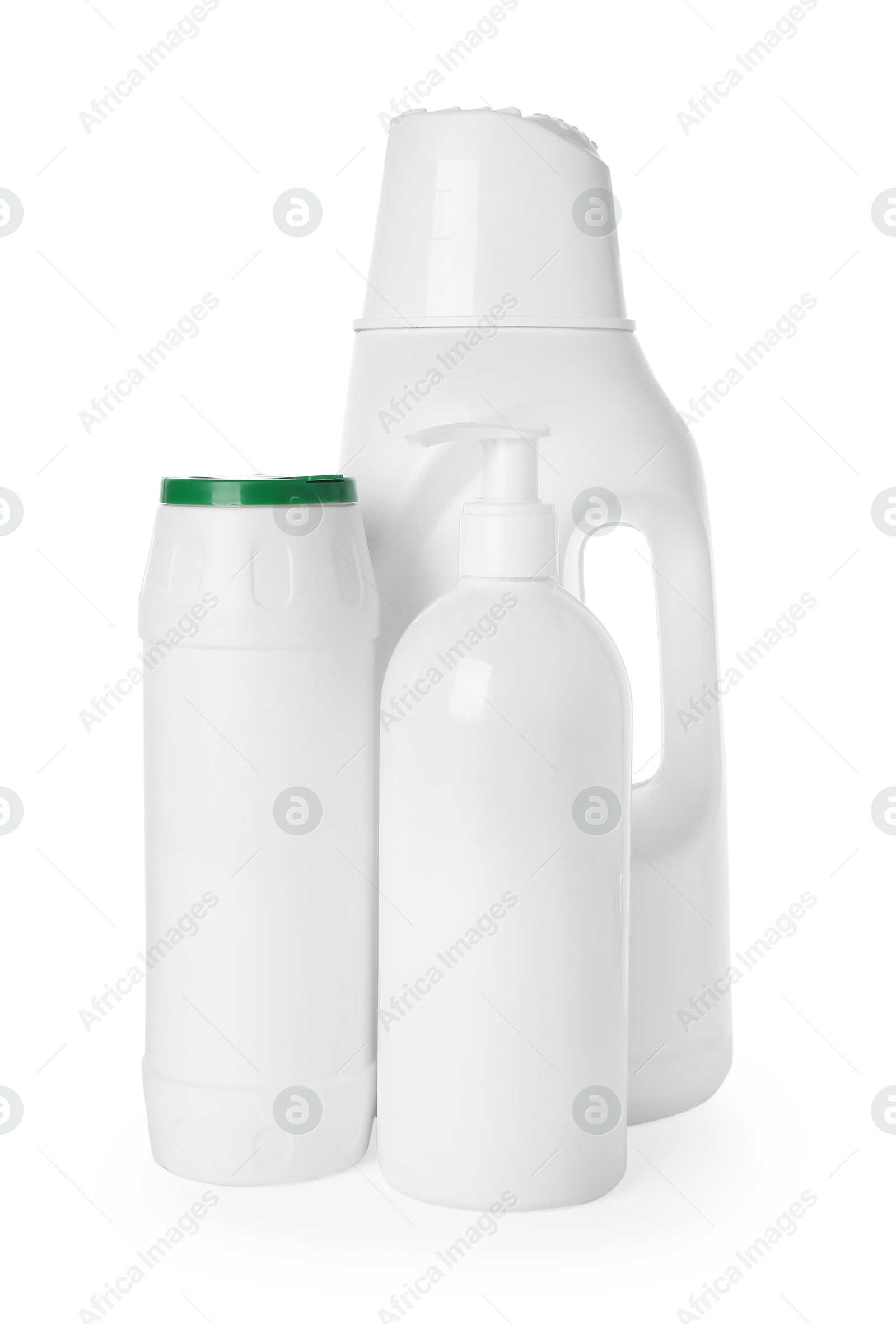 Photo of Bottles of different cleaning products isolated on white