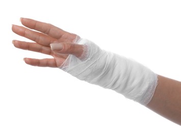 Photo of Woman with medical bandage on wrist against white background, closeup