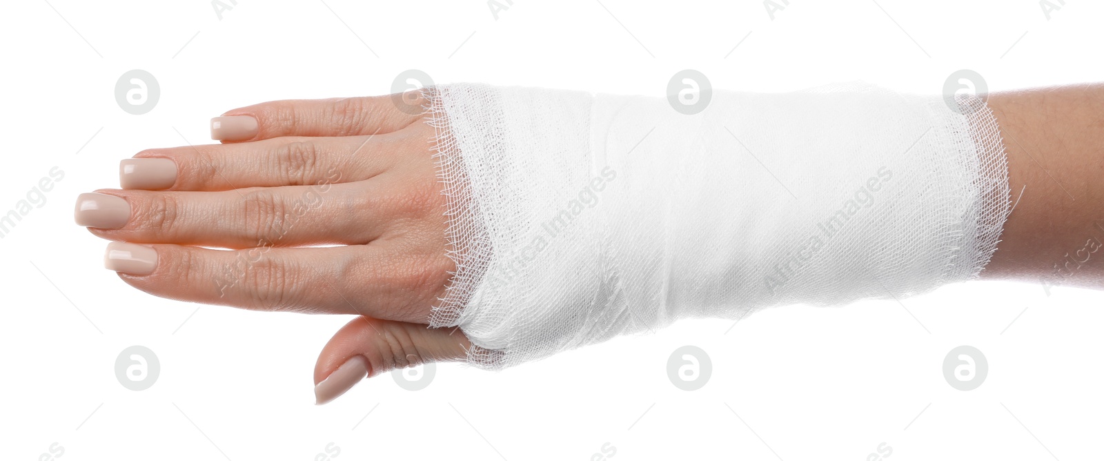 Photo of Woman with medical bandage on wrist against white background, closeup