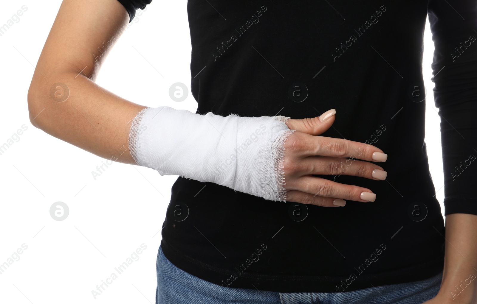 Photo of Woman with medical bandage on wrist against white background, closeup