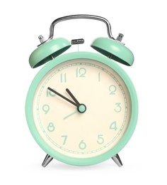 Photo of One turquoise alarm clock isolated on white