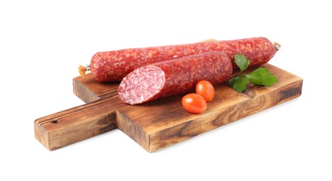 Photo of Delicious smoked sausages with parsley and tomatoes isolated on white