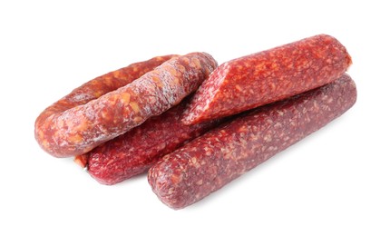 Photo of Many different smoked sausages isolated on white