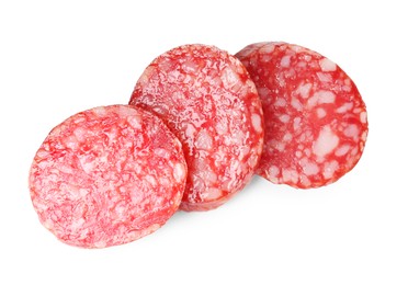 Photo of Pieces of delicious smoked sausage isolated on white, top view