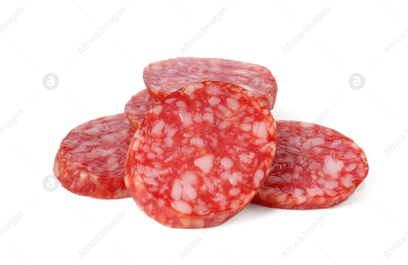 Photo of Pieces of delicious smoked sausage isolated on white