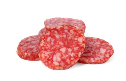 Photo of Pieces of delicious smoked sausage isolated on white