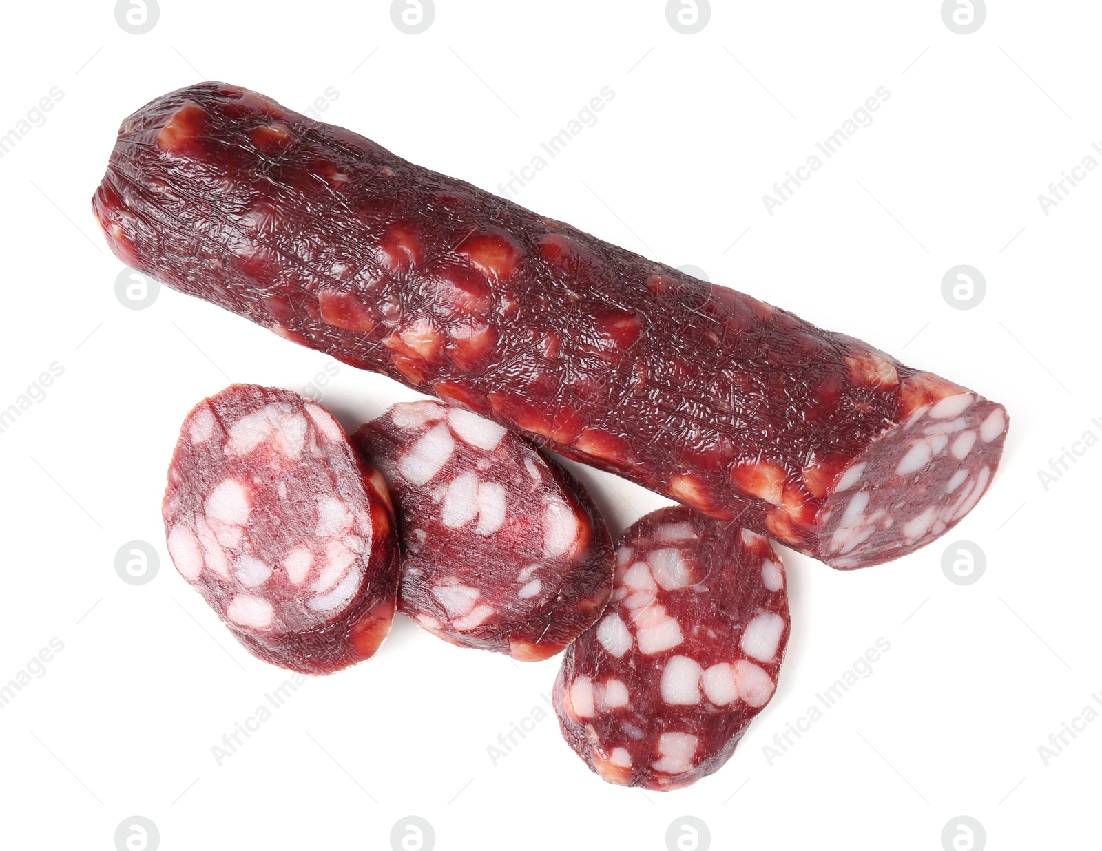 Photo of Delicious dry cured sausage isolated on white, top view