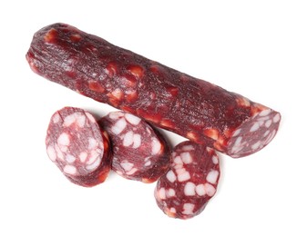 Photo of Delicious dry cured sausage isolated on white, top view