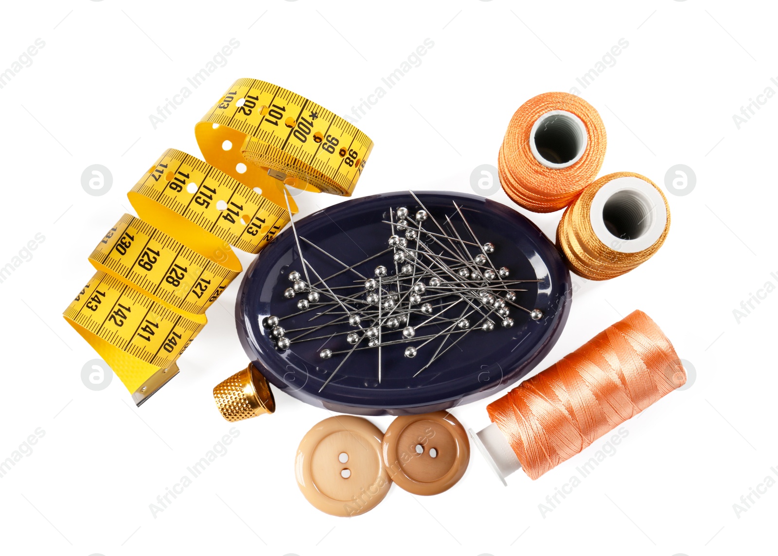 Photo of Different sewing supplies isolated on white, top view