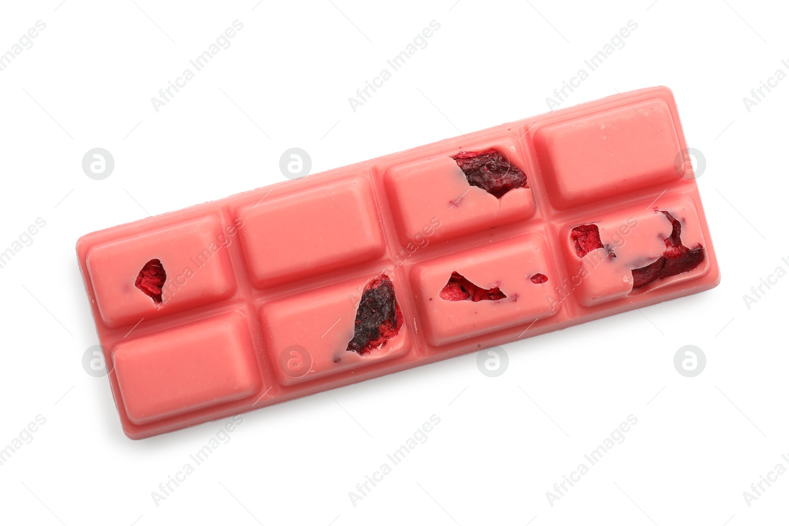 Photo of One tasty chocolate bar with pieces of berries isolated on white, top view