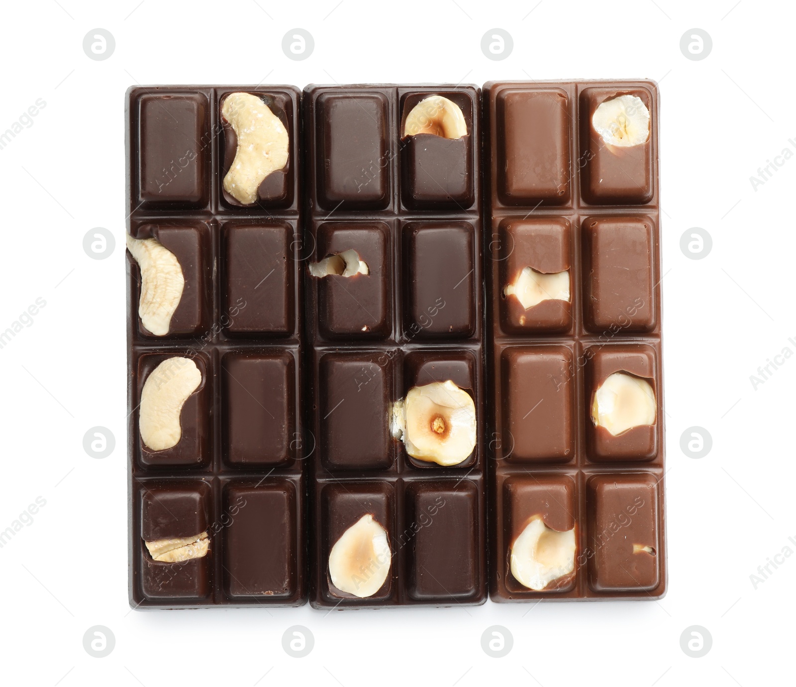 Photo of Tasty chocolate bars with nuts isolated on white, top view