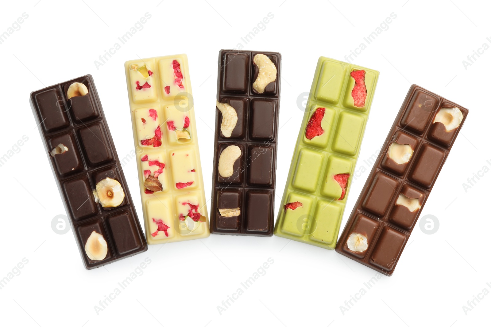 Photo of Different tasty chocolate bars isolated on white, top view