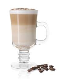 Photo of Tasty latte macchiato in glass cup and coffee beans isolated on white