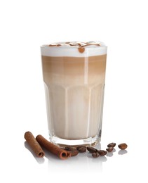 Photo of Tasty latte macchiato in glass, coffee beans and cinnamon isolated on white