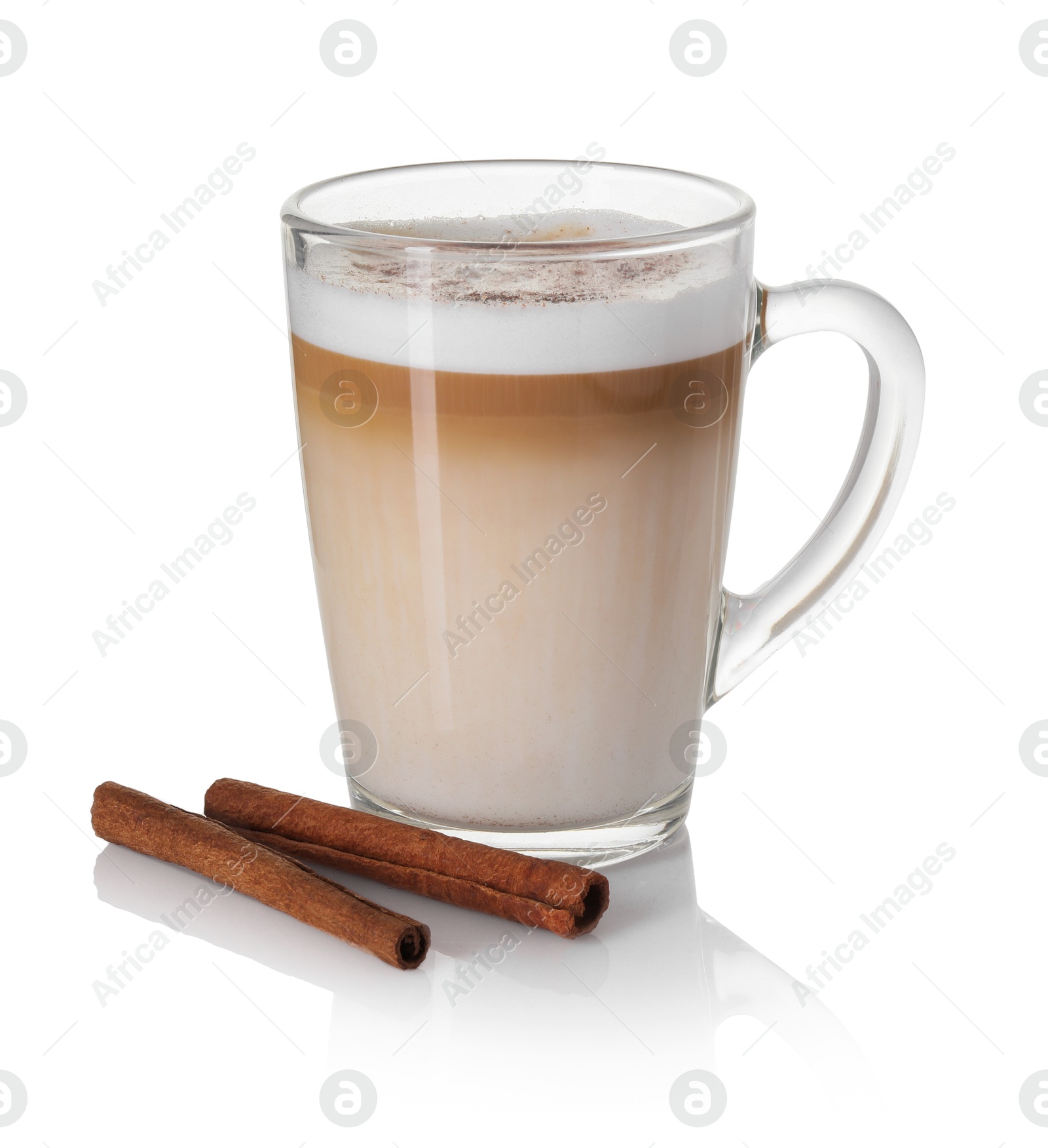 Photo of Tasty latte macchiato in glass cup and cinnamon isolated on white