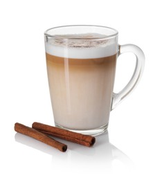 Photo of Tasty latte macchiato in glass cup and cinnamon isolated on white