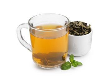 Photo of Aromatic mint tea, fresh and dried leaves isolated on white