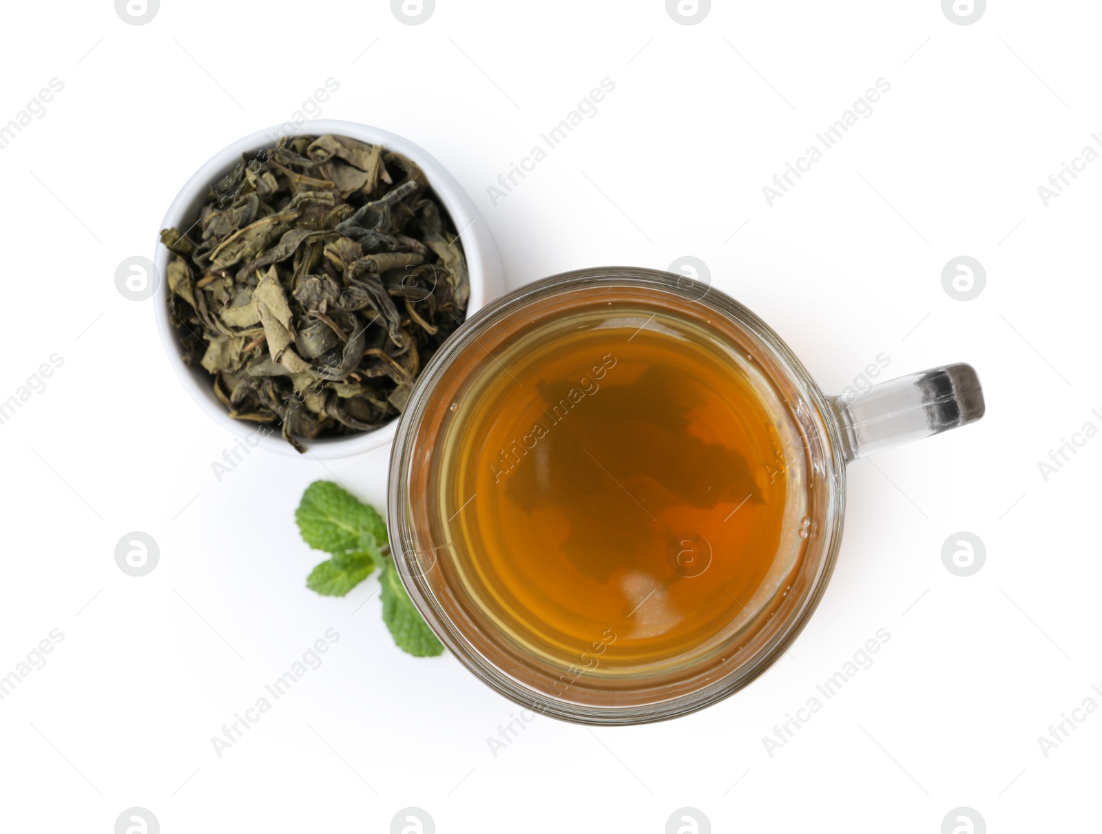 Photo of Aromatic mint tea, fresh and dried leaves isolated on white