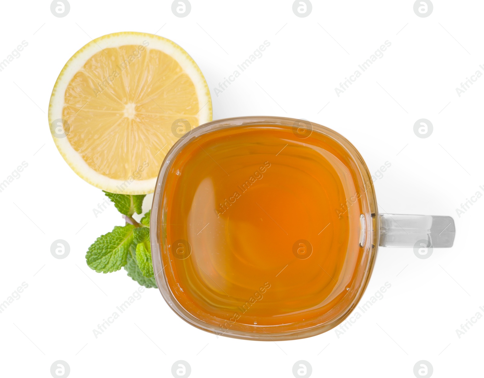 Photo of Aromatic mint tea with lemon, fresh and dried leaves isolated on white