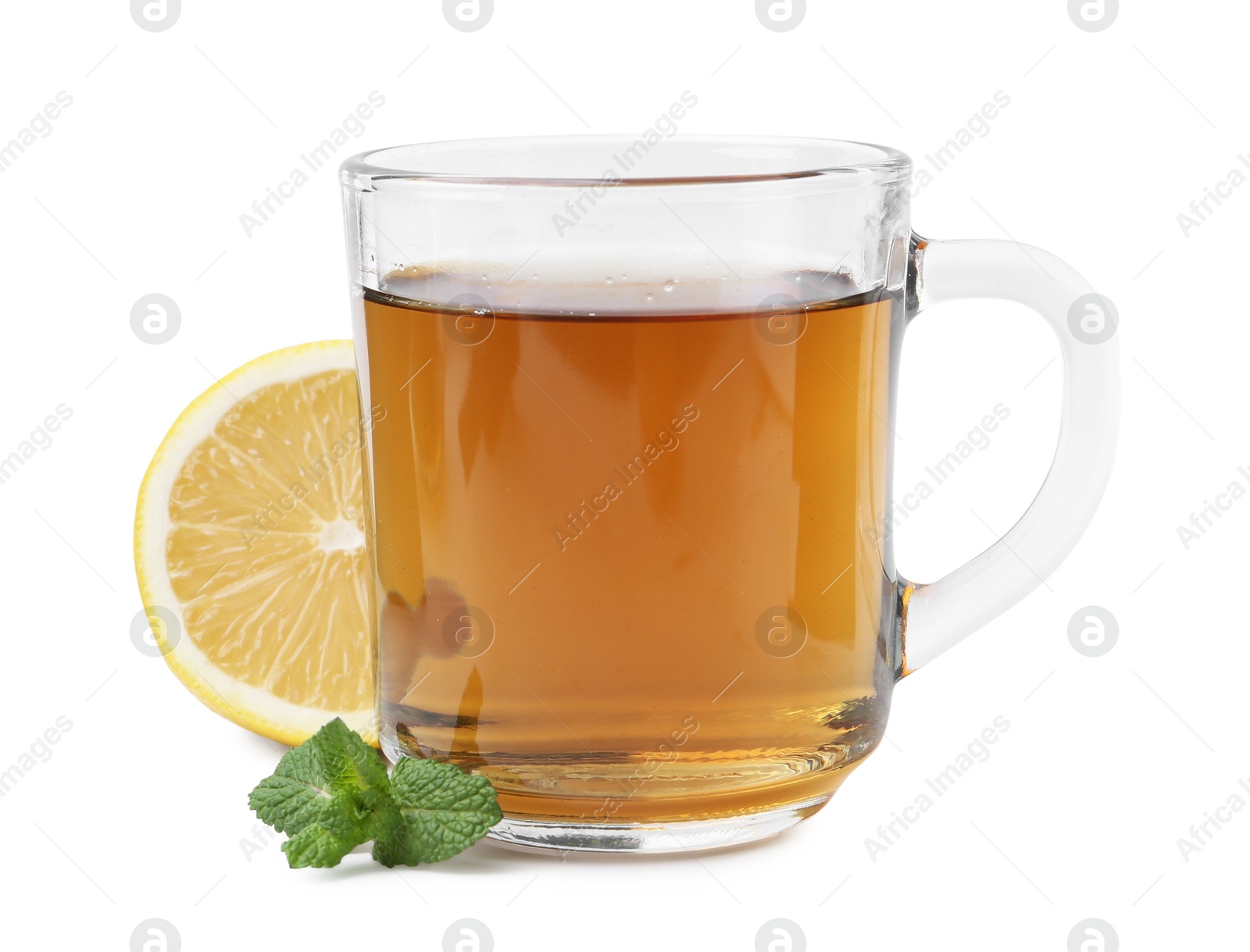 Photo of Tasty mint tea in cup, lemon and fresh leaves isolated on white