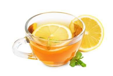 Photo of Tasty mint tea in cup, lemon and fresh leaves isolated on white