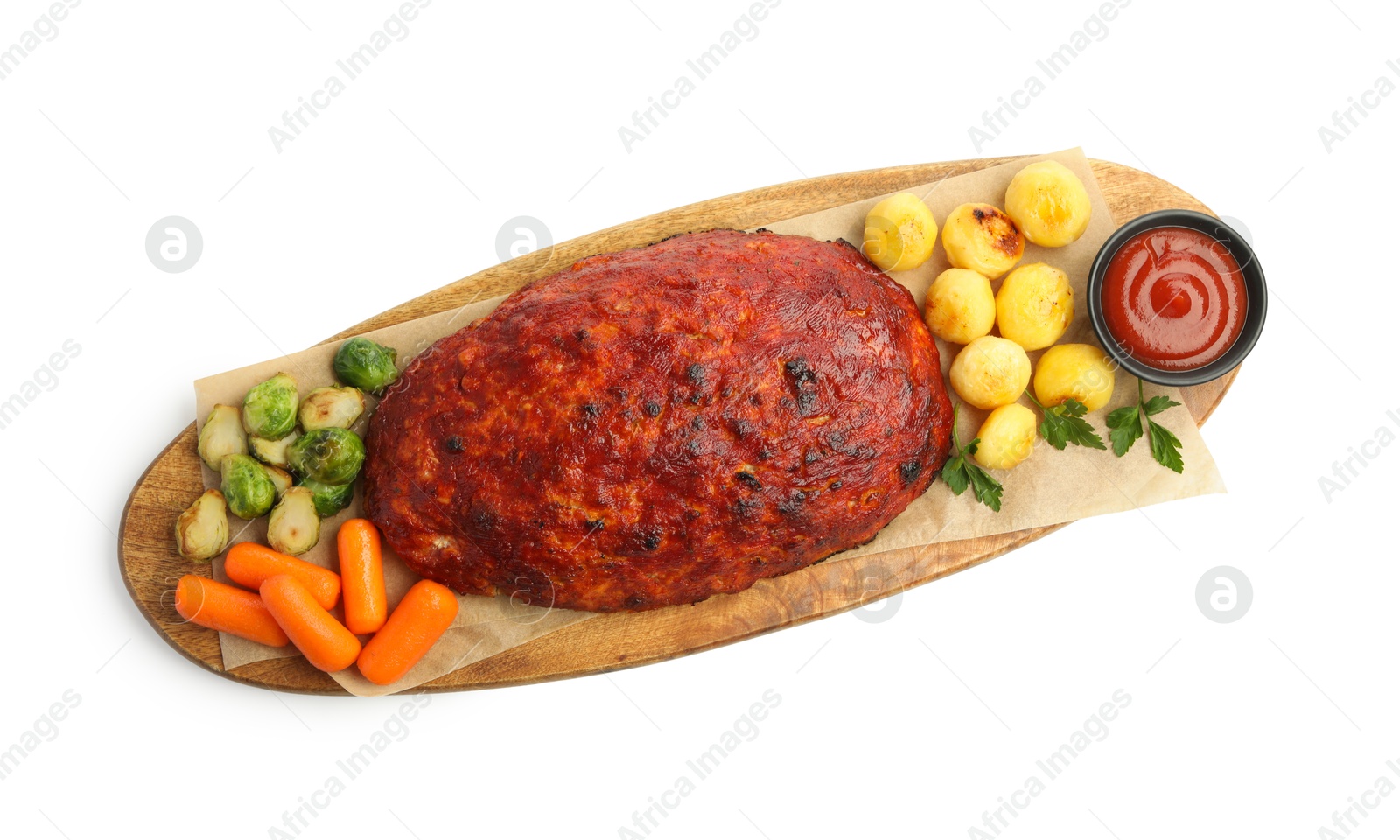 Photo of Delicious turkey meatloaf with vegetables and sauce isolated on white, top view