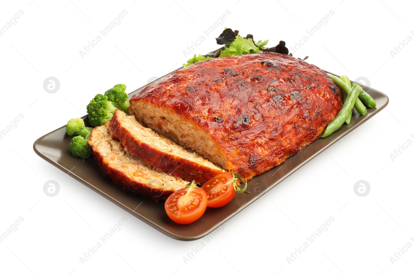 Photo of Delicious turkey meatloaf with vegetables isolated on white