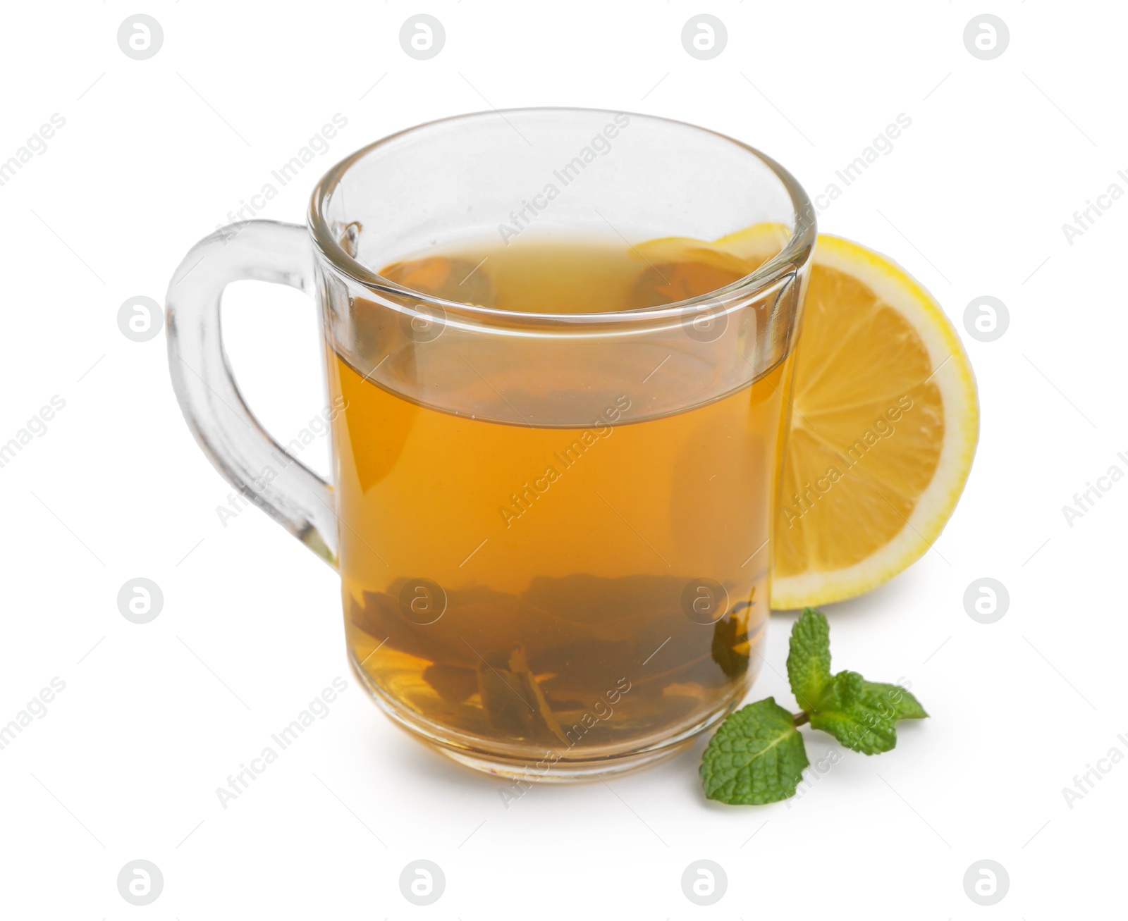 Photo of Aromatic mint tea with lemon, fresh and dried leaves isolated on white