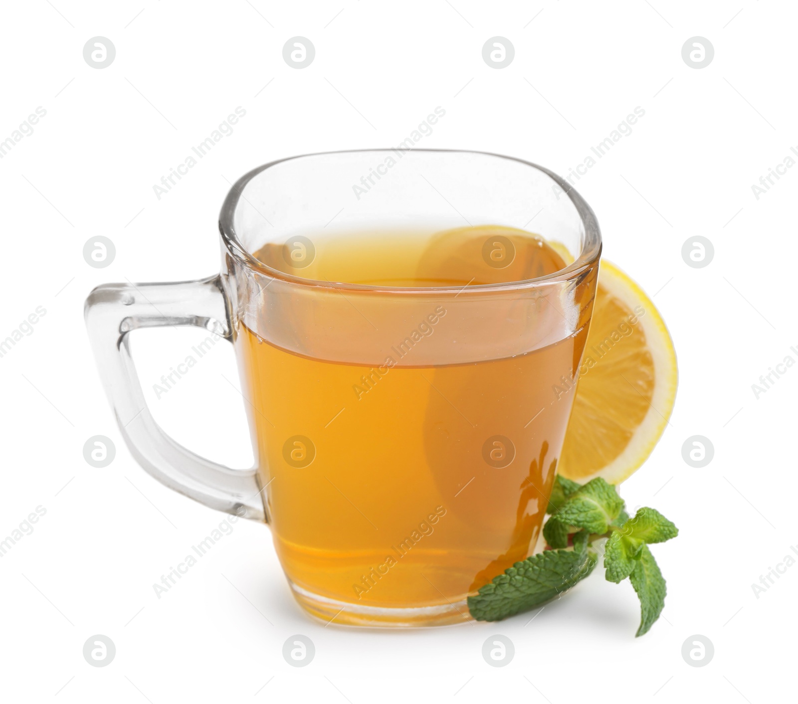 Photo of Aromatic mint tea with lemon, fresh and dried leaves isolated on white