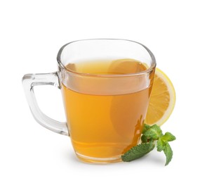 Photo of Aromatic mint tea with lemon, fresh and dried leaves isolated on white