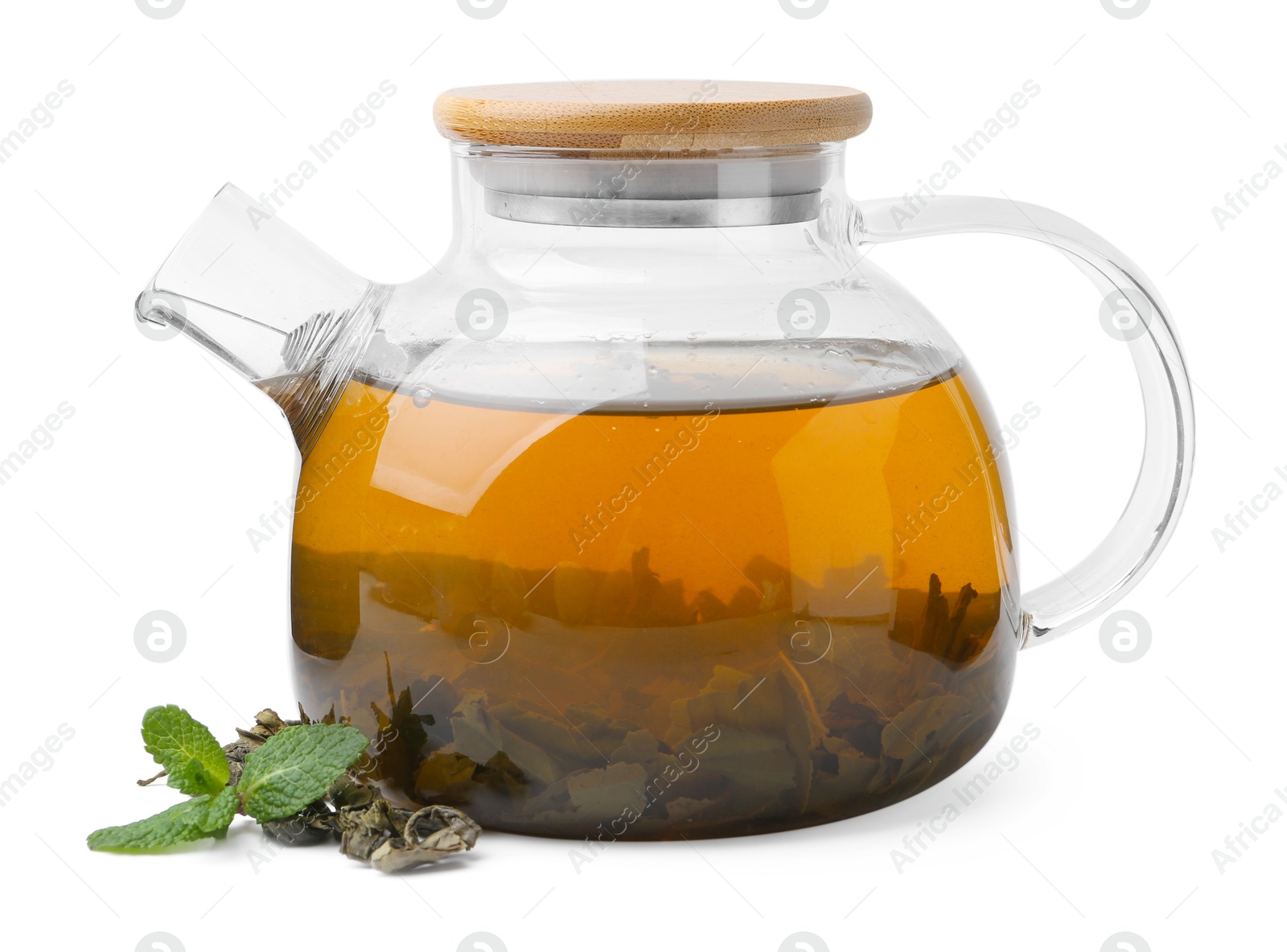 Photo of Aromatic mint tea, fresh and dried leaves isolated on white