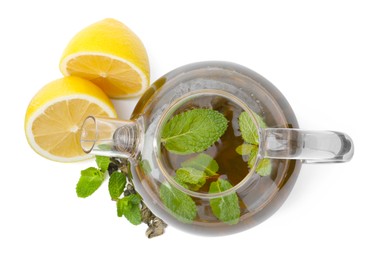 Photo of Aromatic mint tea with lemon, fresh and dried leaves isolated on white