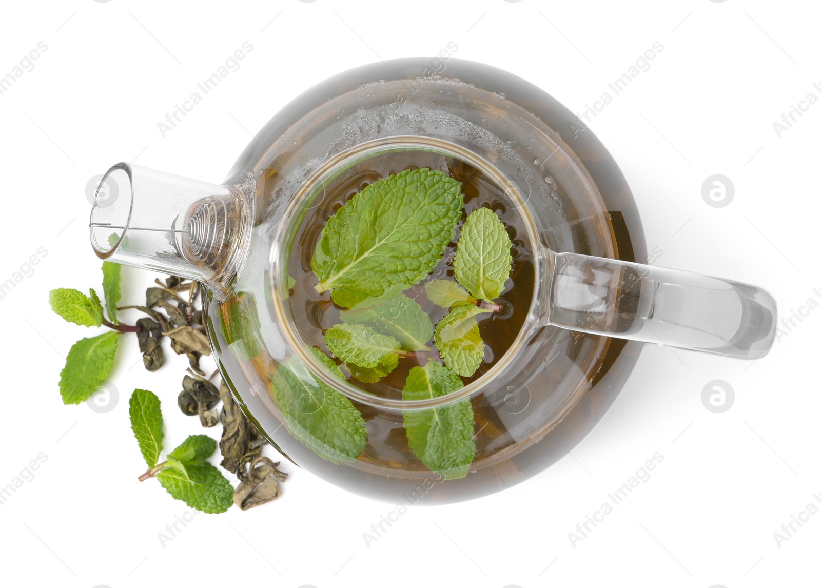 Photo of Aromatic mint tea, fresh and dried leaves isolated on white