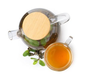 Photo of Aromatic mint tea, fresh and dried leaves isolated on white